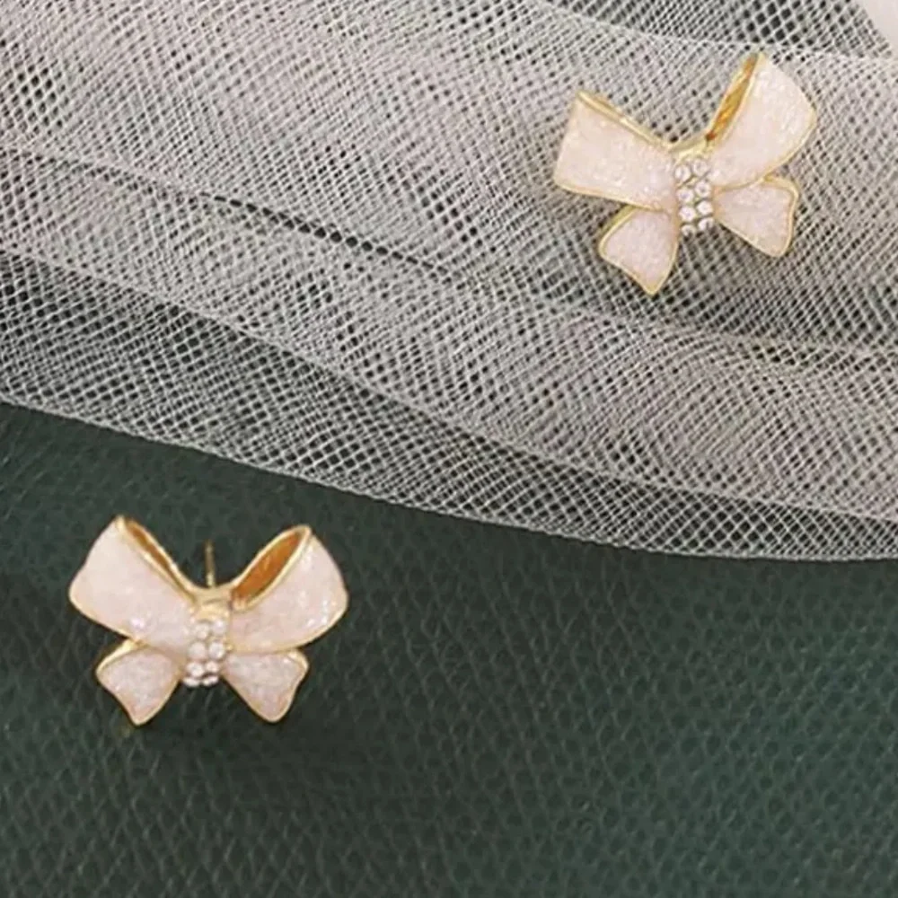 Cream Colored Gold Bow Earrings - Picture 4 of 8